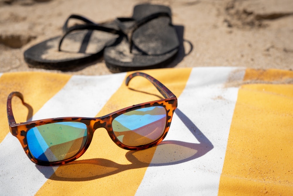 Beach towel and sunglasses